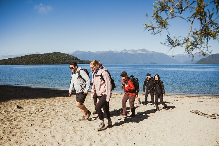 Disembark the jet boat at Lake Manapouri.